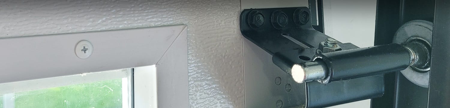 Residential garage door roller in need of replacement service