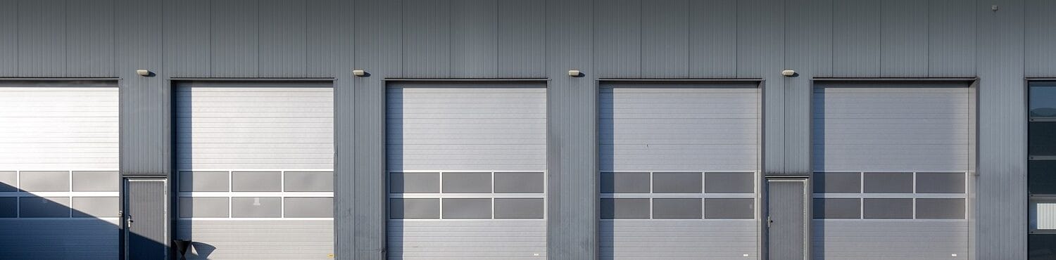Commercial garage door service for Chicago businesses and industrial facilities with multiple dock doors