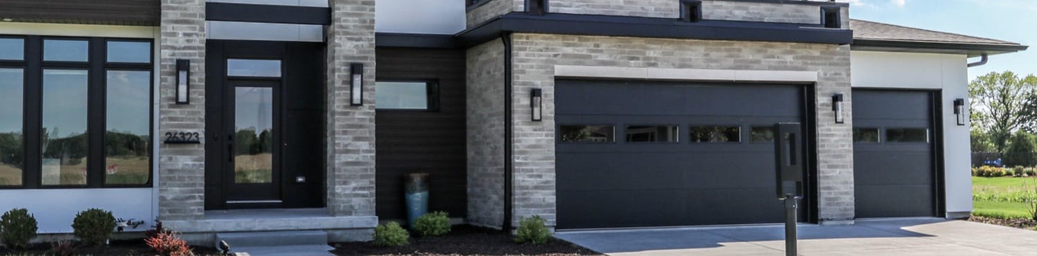 Black flush garage doors helps match the more contemporary style home, garage door resources can help customers find the perfect match