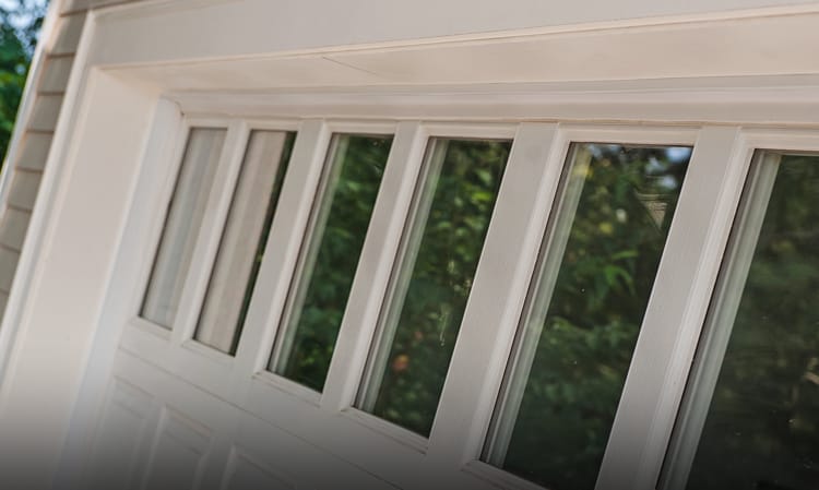 Chicago's provider of high quality residential garage door products and service including glass top sectional garage doors