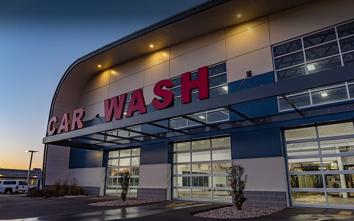 Car wash facility with fullview commercial garage doors in need of repair service